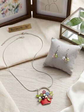 Bon Worth costume jewelry set, featuring a floral basket pendant necklace & ear